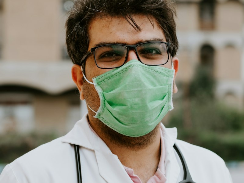 Physician in a bright clinical space