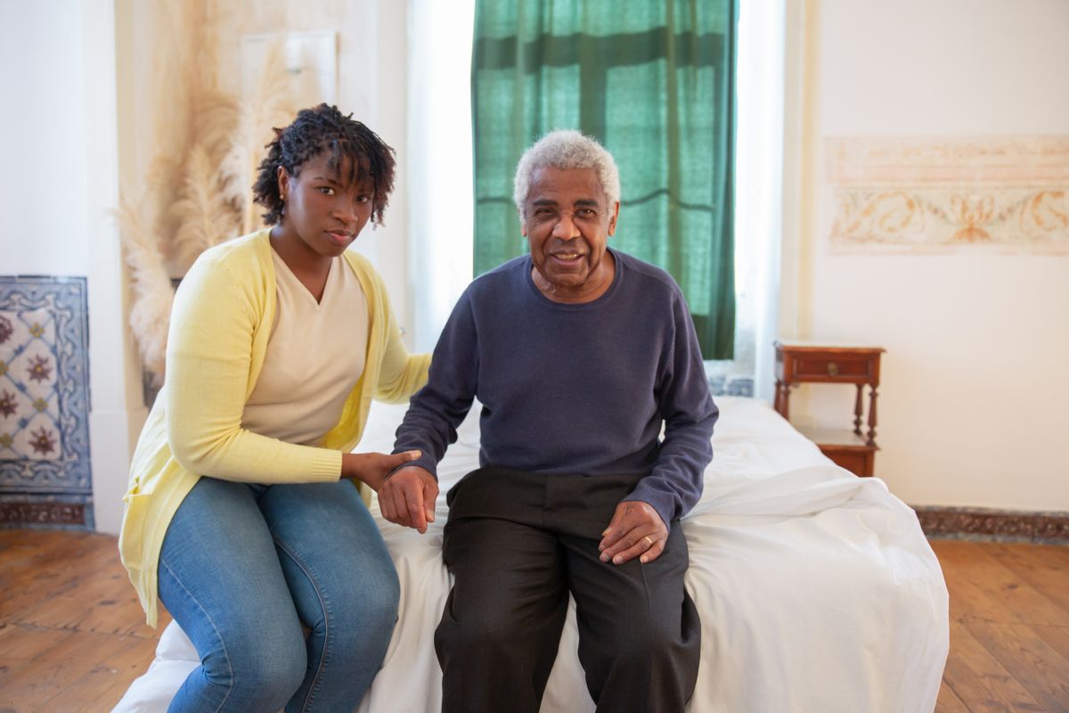 A nurse spending unhurried time with an older adult